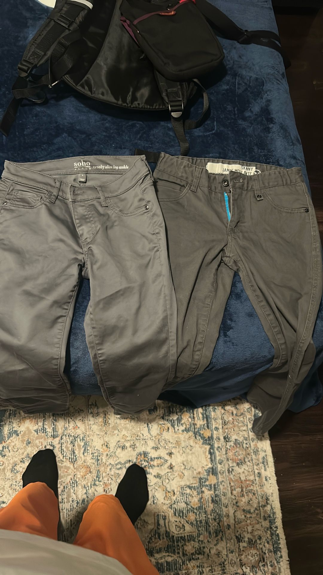 Three pairs of pants, two size 0 one size 2