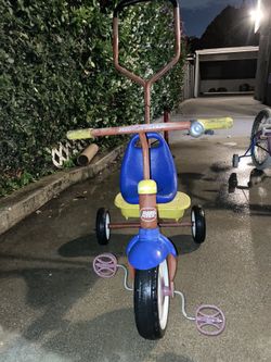 tricycle with long steering handle