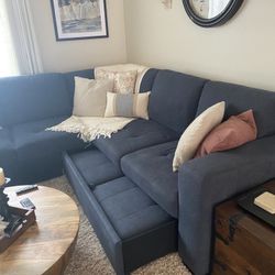 Sectional With Sleeper