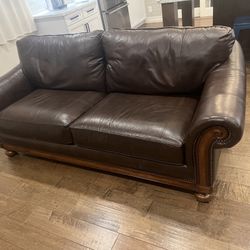 Beautiful brown leather sofa, and loveseat