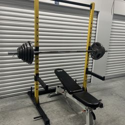 Squat Rack, Weights, Bench and Bar . Exercise Equipment