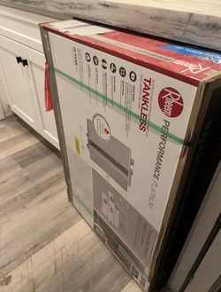 NEW RHEEM Tankless Gas Water Heater 