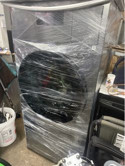 Samsung all in one front load black stainless steel 5.3 cu ft  with pedestal