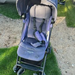 Maxi-Cosi Stroller Measuring 40 Inches High By 26 Inches Long And 20 Inches Wide