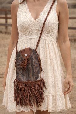 One-of-a-Kind Statement Piece: Handcrafted from authentic vintage El Dorado cowboy boots.