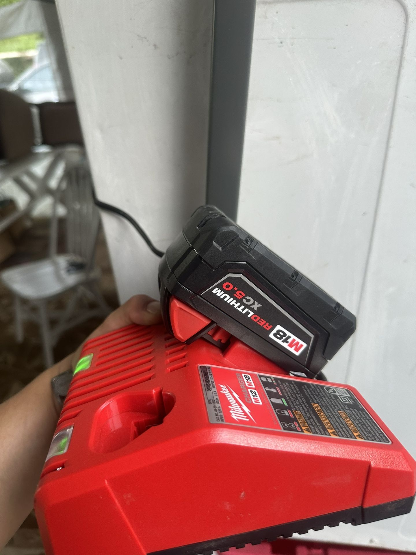 NEW Fuel Milwaukee Weedwacker NEW With Charger and A 5.0 Battery Package