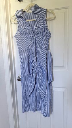 Women’s collared sleeveless below knee dress
