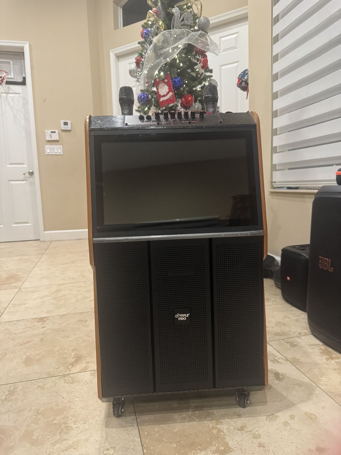 Pyle Portable Wireless BT Streaming Karaoke Machine Loudspeaker with Touch Screen and Wireless Microphone, Wheels and Handle Bar, Supports USB/SD/MMC/