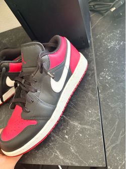 Red and black Jordan 1s lows