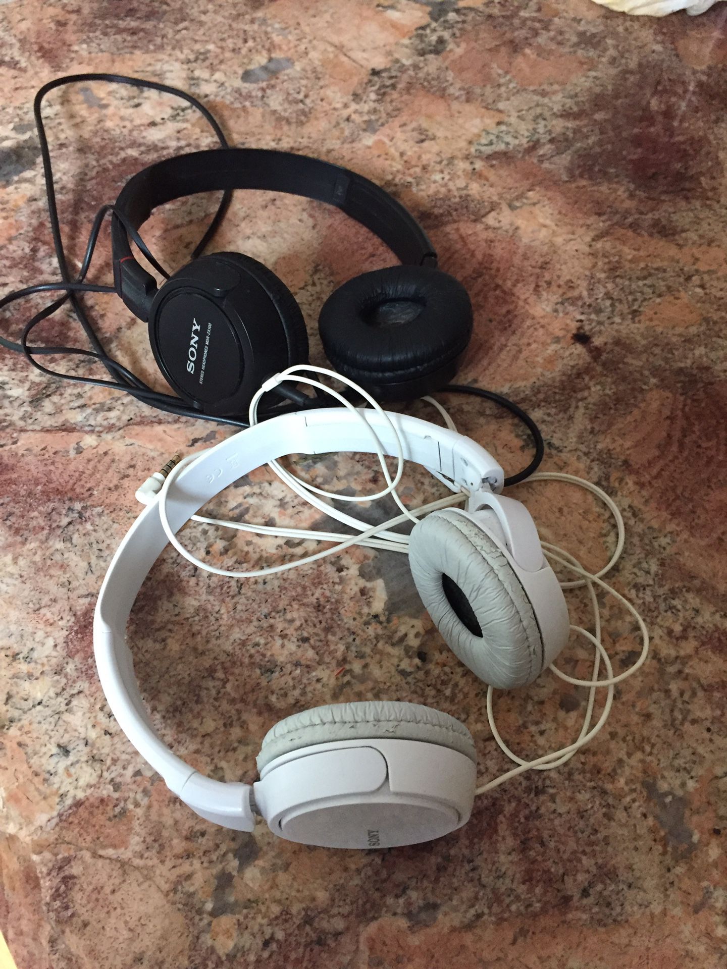 Two Sony headphones
