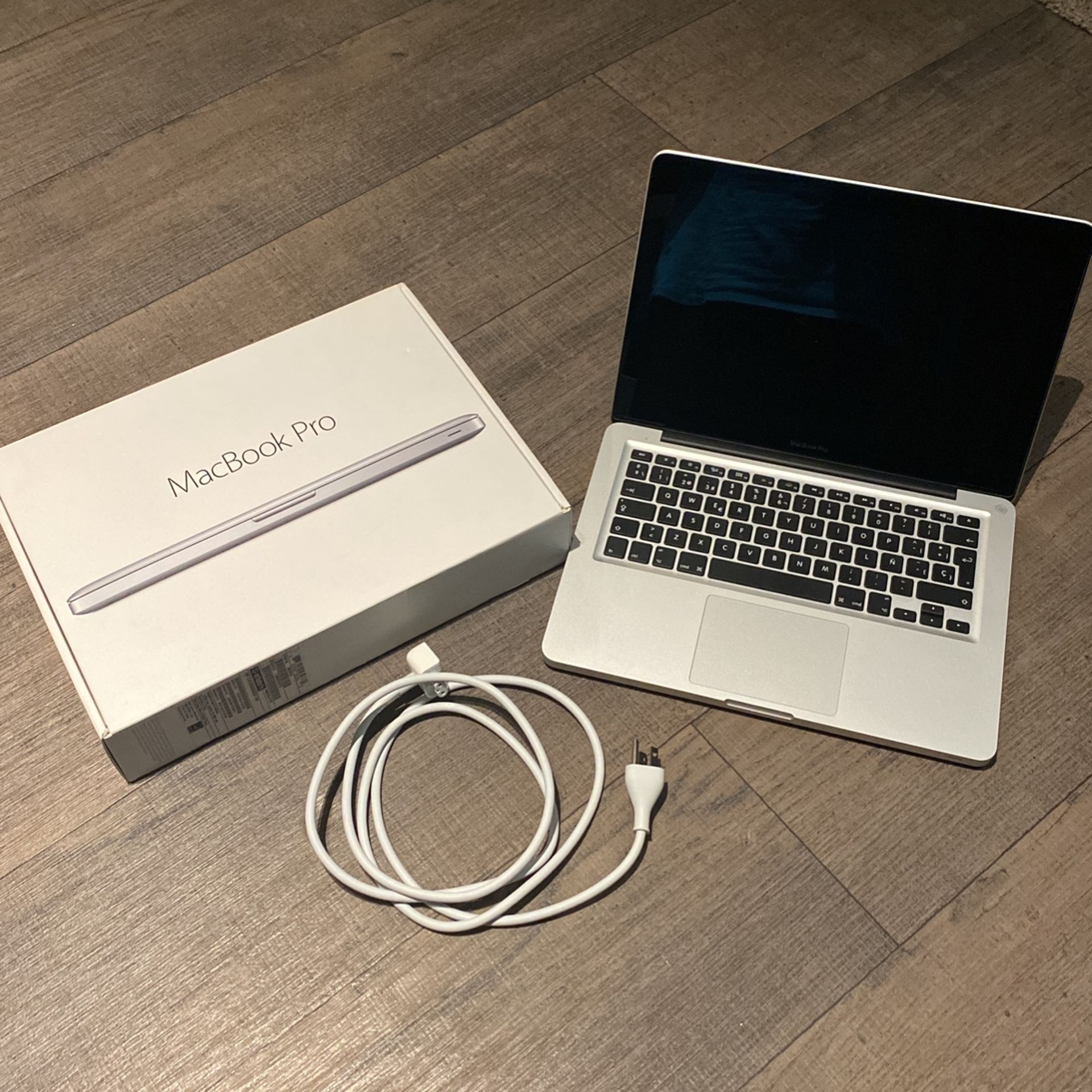 Used 13.3 In. MacBook Pro with charger excellent Condition