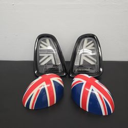 Mini cooper 2007 —2013 union jack smoked tail lights and oem Genuine MINI union jack mirror caps.