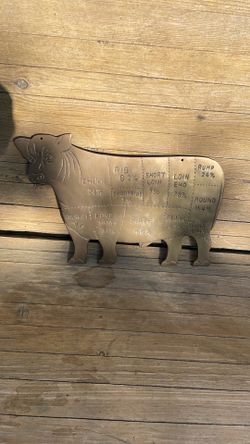 Nice heavy brass original cow meat market sign.