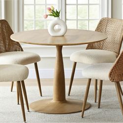 Round pedestal dining table