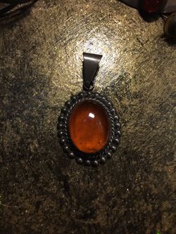Beautiful amber color necklace charm