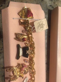 Vintage Kirks folly Alice in Wonderland charm bracelet. Price