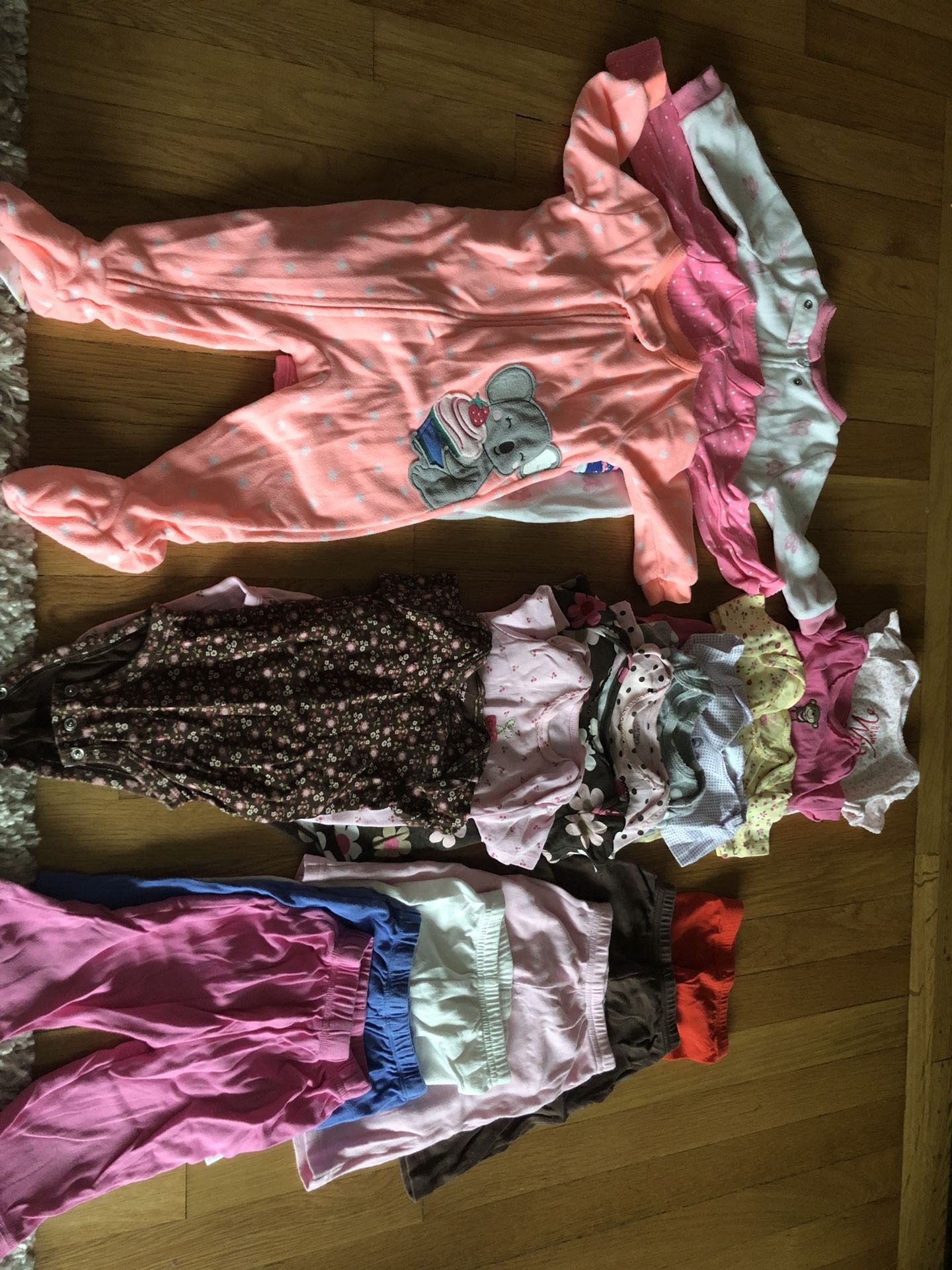 Carter’s brand bundle. All size 6 months. Three pairs of pajamas, 4 leggings & 9 onesies. None of them are dirty they are just wrinkly from being in