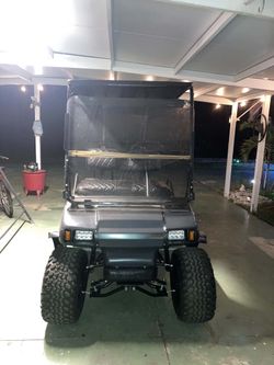 Lifted Golf Cart with LED Headlights