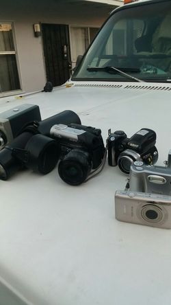 Found in a storage locker what-you-see-is-what-you-get 3 lenses and 6 cameras