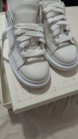 Authentic Alexander McQueen's with papers size 9.5 men and size 11 women