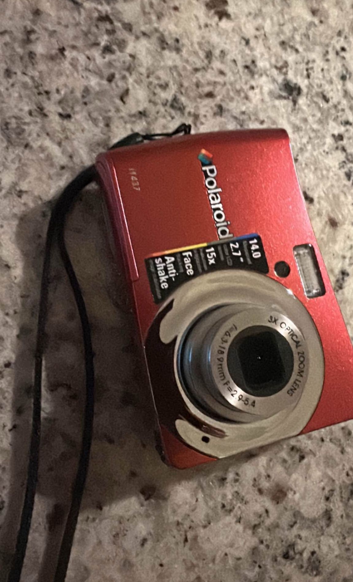Polaroid i1437 digital camera, which is a compact point & shoot camera with a 14megapixel sensor
