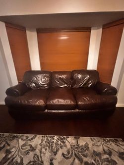 Dark brown leather sofa