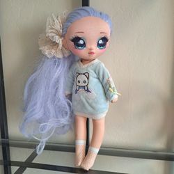 Na! Na! Na! Surprise Ultimate Surprise Rainbow Kitty Doll with some accessories 