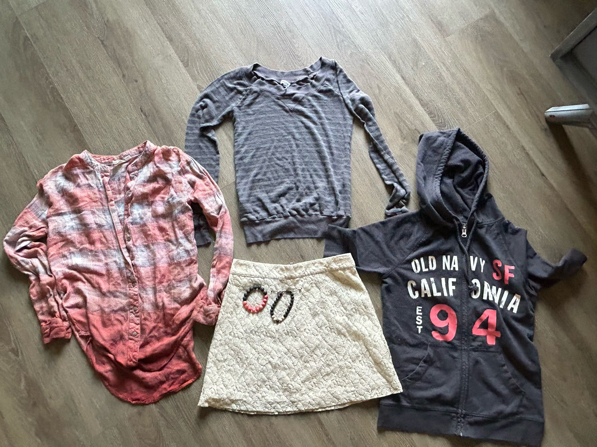 A Bundle Variety Set Of Woman’s Size XS Clothing With Two Brackets