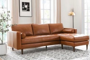 Leather sectional with reversible chase