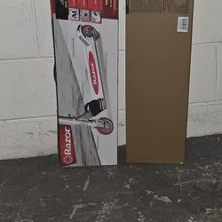 2 Scooters And 1 Helmet Brand New In The Box $25.00 Each