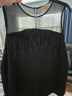 Michael Kors XL black top with a soft fringe. Never worn, excellent condition,  runs a bit small, very cute $20.  Cute Dress, beautiful colors never w
