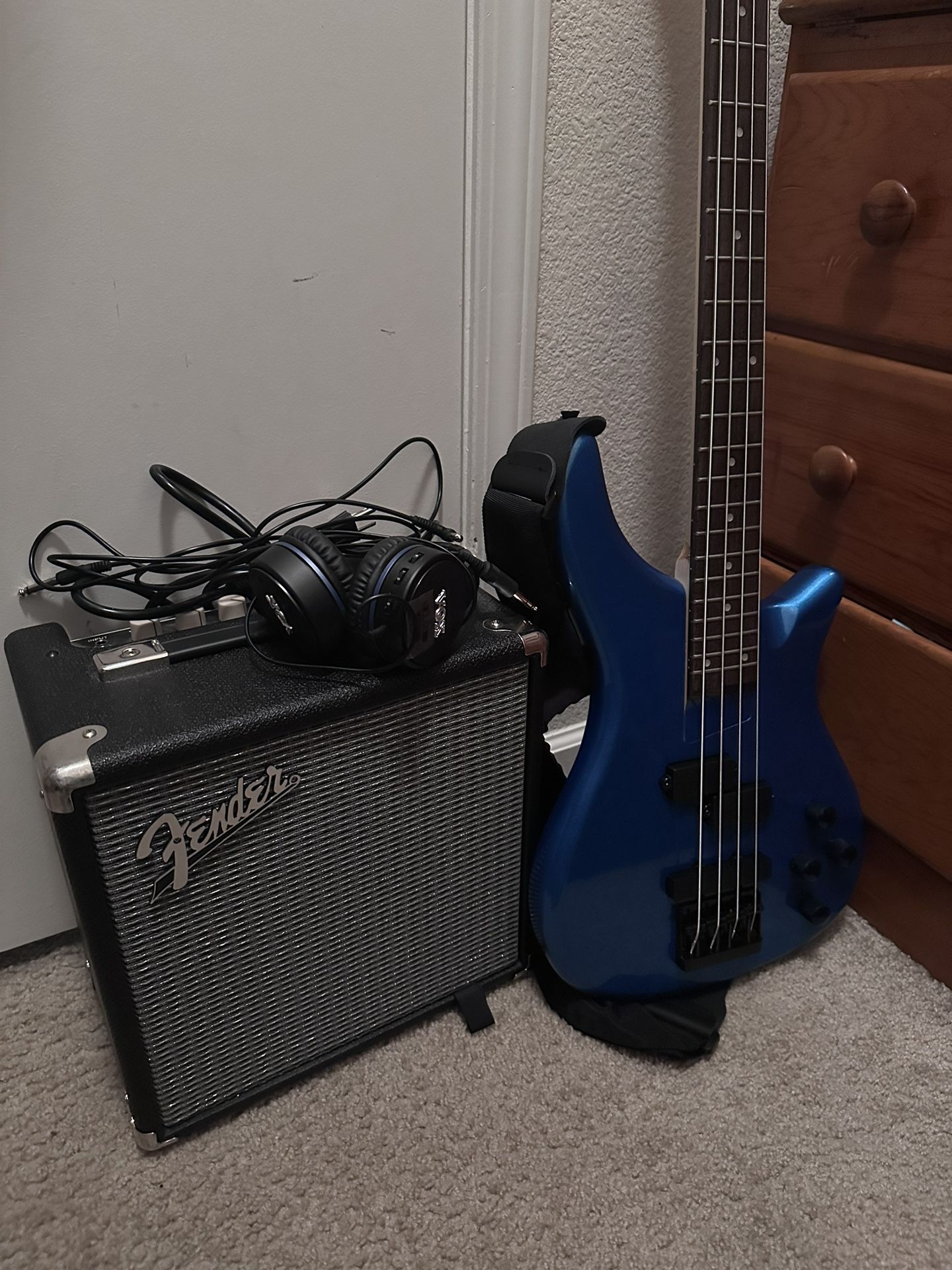 Electric guitar with headphones & amplifier