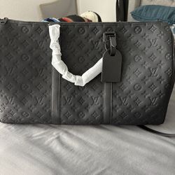 Black lv duffle