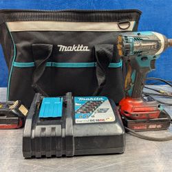 Makita Impact Driver + 2 Batteries And Charger