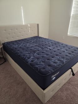 Queen bed frame + mattress included
