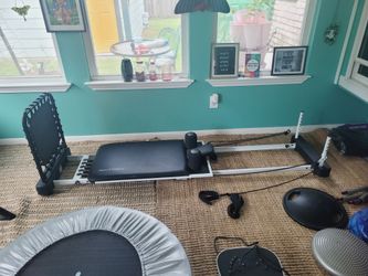 AeroPilates reformer with rebound plate