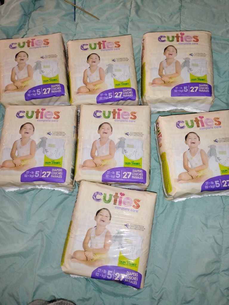 7 Packs Of 27 CT size 5 Cutie Diapers 