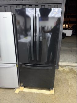 Brand new Whirlpool 33 in. 22 cu. ft. Standard Depth French Door Refrigerator in Black