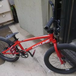 RED LINE PROLINE EXPERT  XL BMX BIKE 6061 T6 ALUMINUM ALLOY TUBBING. FROM THE FLOOR TO THE TOP BAR 21 INCHES. REAR BRAKE ONLY.  