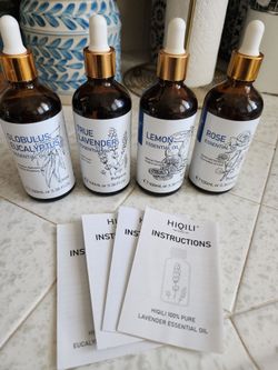 4 large bottles of essential oils