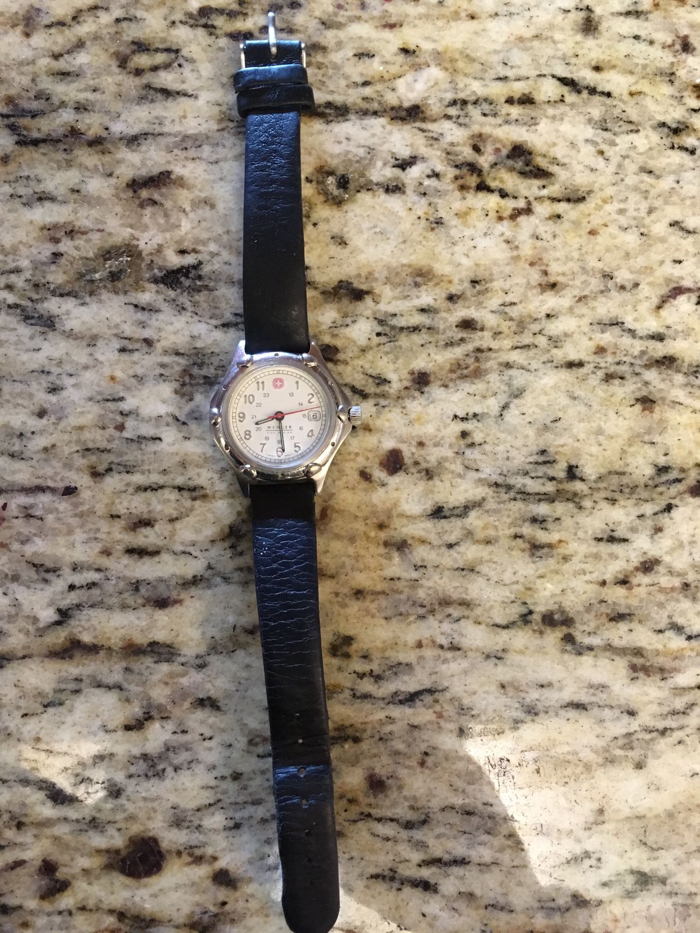 Wenger watch with luminescent hands and date