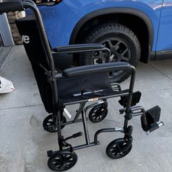 Transfer chair Wheelchair  With Footrest- Aluminum Slim Model. Brand new!