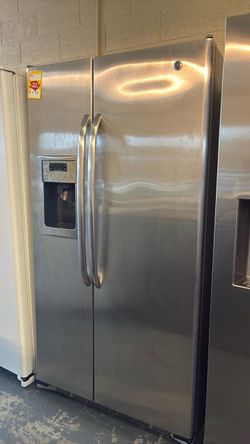 Like new GE side by side refrigerator