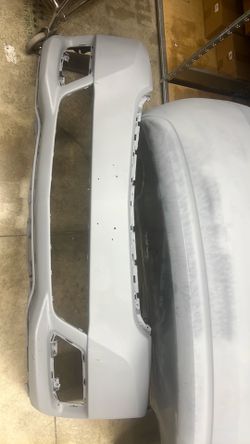 Front bumper and rear bumper