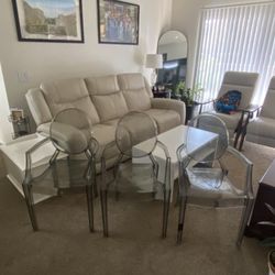 3 Clear Chairs
