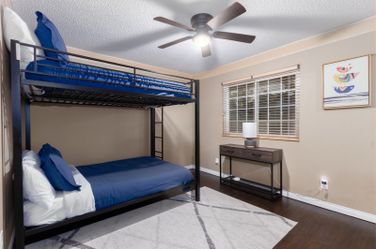 Bunk bed with mattress and bedding