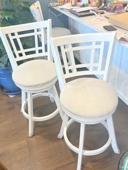 Hey look at this!!  Free.   Two wooden swivel stools