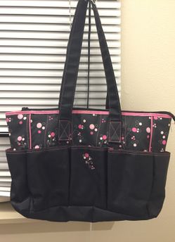 Diaper bag and nursing cover.