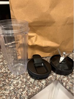 Ninja cup with extra lid