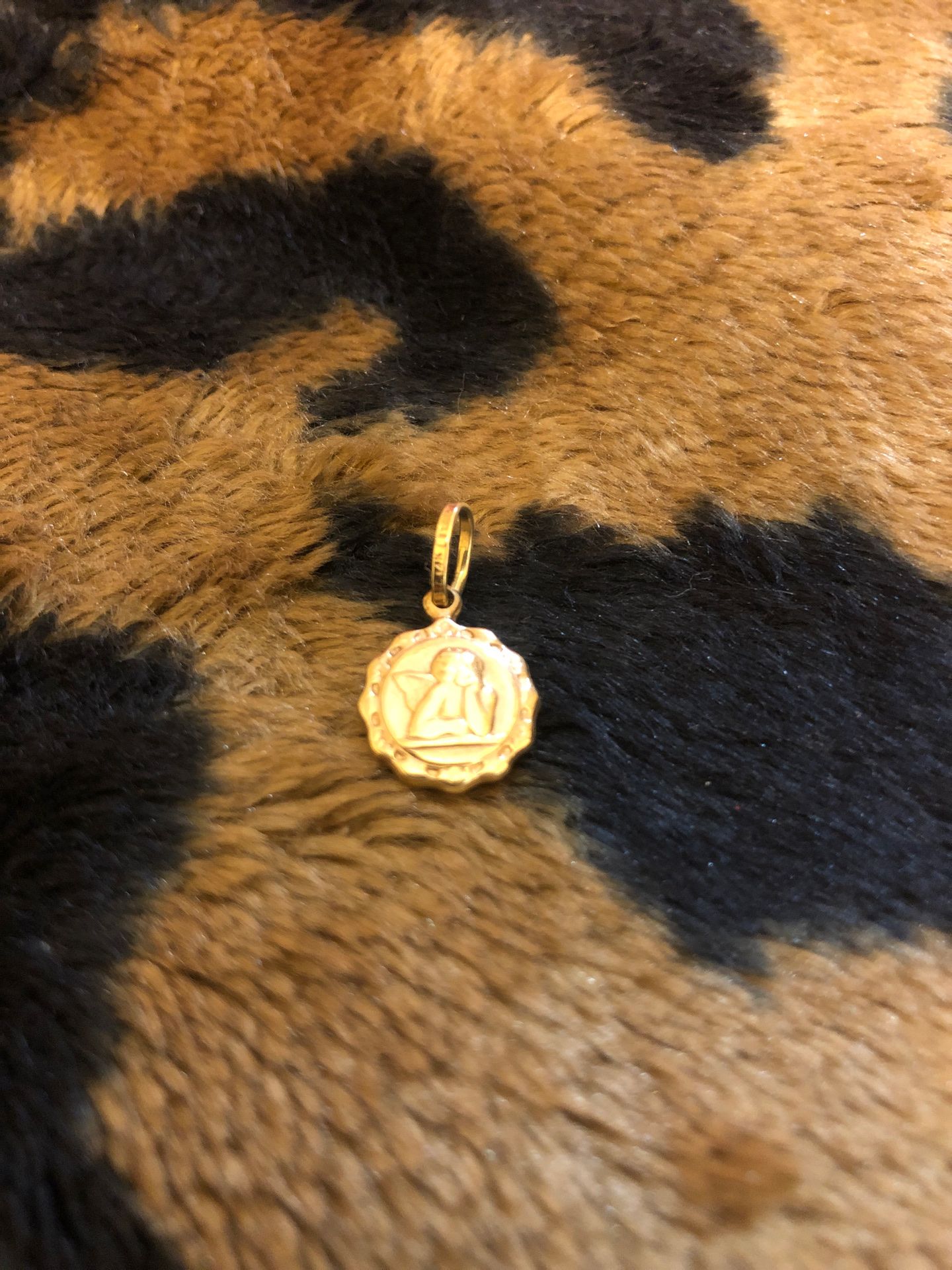 14k yellow gold religious puffy St. Raphael, cherub, or angel pendant/ charm. Stamped 14k, Italy.